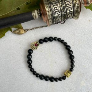 Zwarte obsidiaan met gouden Boeddha en fatima hand