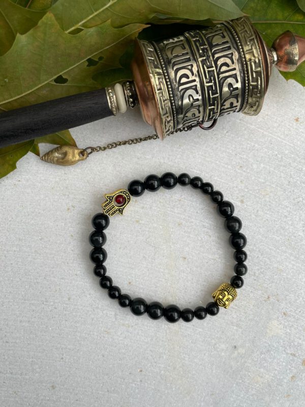 Zwarte obsidiaan met gouden Boeddha en fatima hand