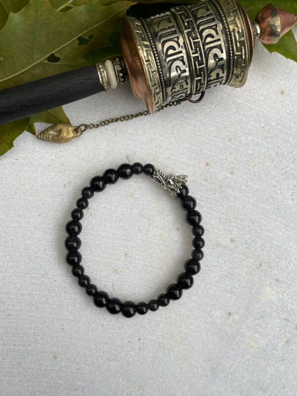 Zwarte obsidiaan zilveren draak